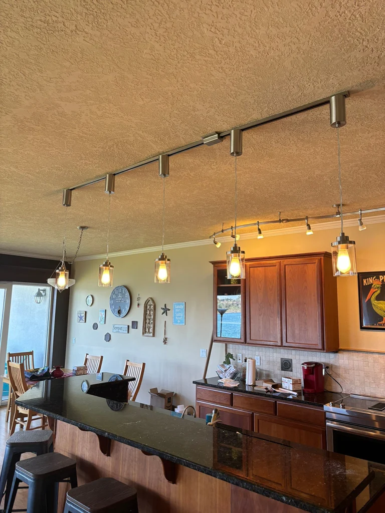 A residential home with newly-installed kitchen light fixtures in Yachats Oregon